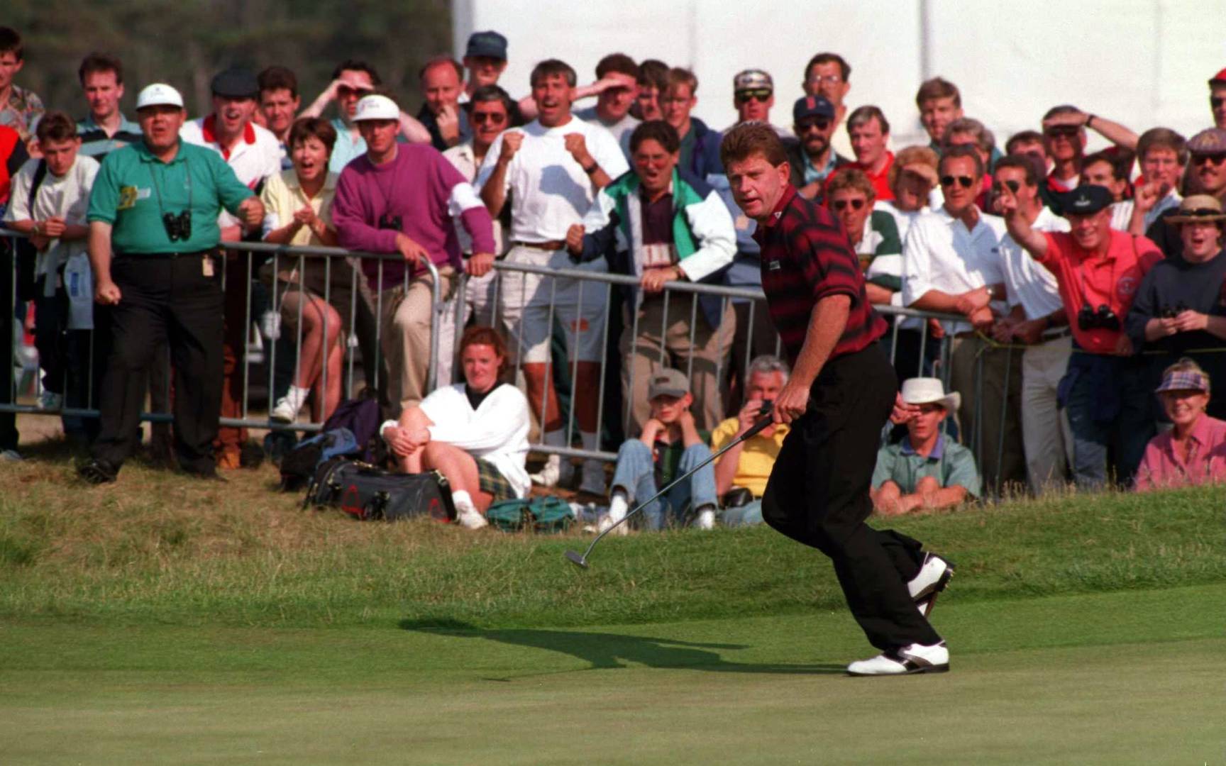 Nick Price watches as his ball reaches the hole for eagle on the 17th in the final round at Turnberry in 1994